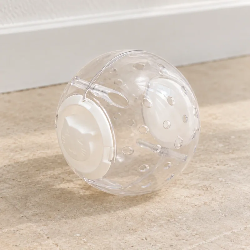 Clear ABS treat ball with white side discs and a small cat-face detail