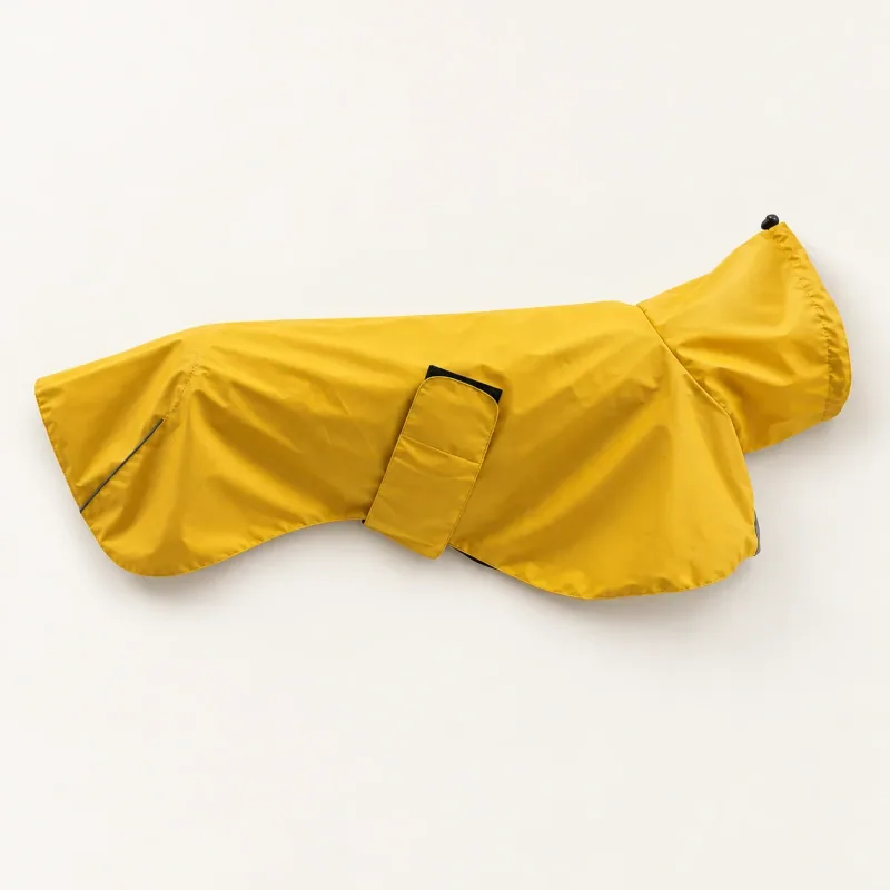 Yellow wrap-style dog rain shell laid out without an animal.
