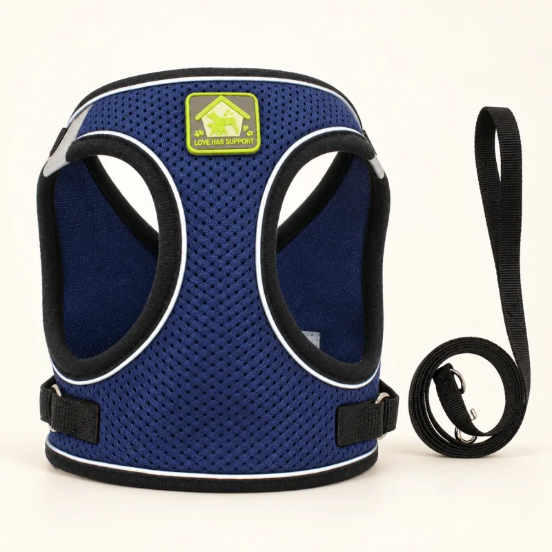 Navy mesh cat harness with its black lead
