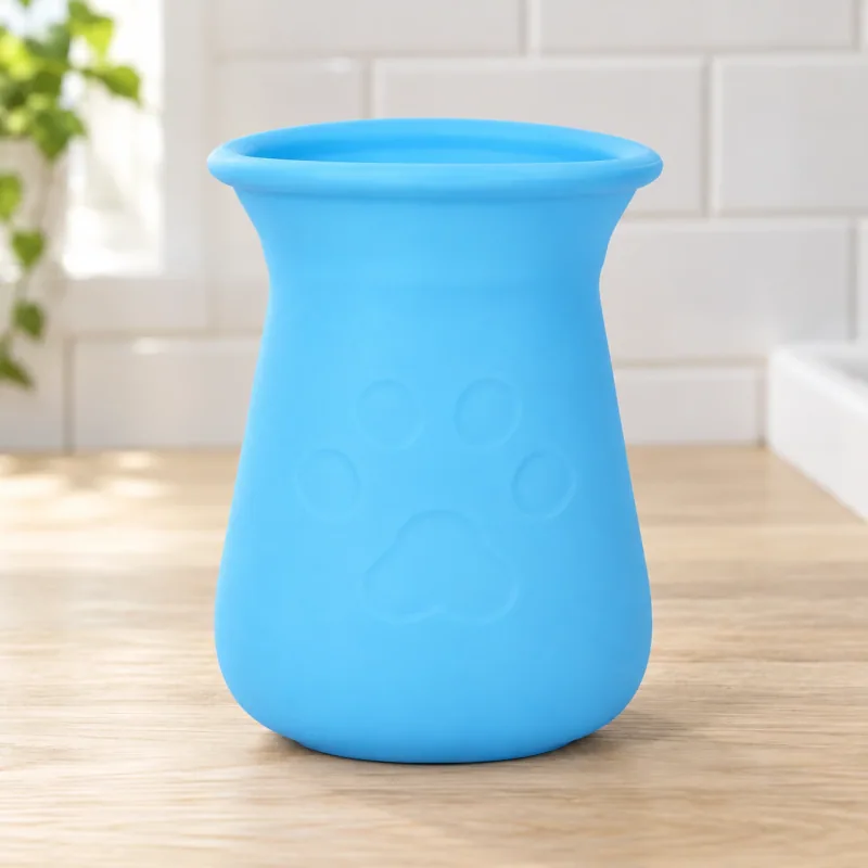 One blue silicone paw-cleaning cup.