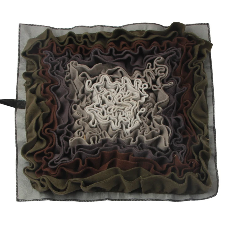 Square sniffing mat with dense cream, gray, brown and olive fabric folds.