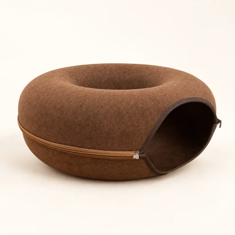 Brown felt cat retreat showing the upper resting area, side entrance and zipper seam.