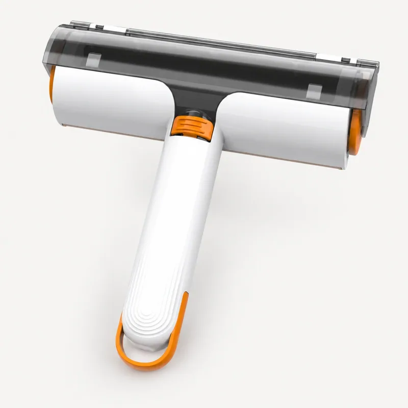 White and orange pet hair roller with collection chamber